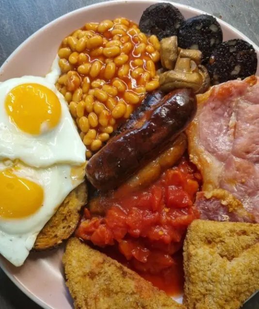 Full Scottish breakfast with eggs, bacon, sausage and toast